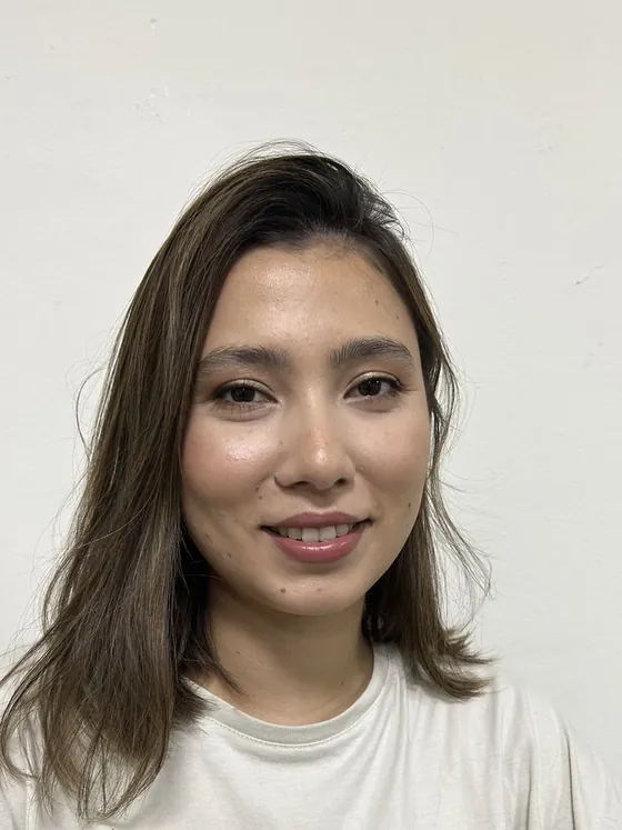 Fresh, skin-first makeup with defined lashes and a rosy lip